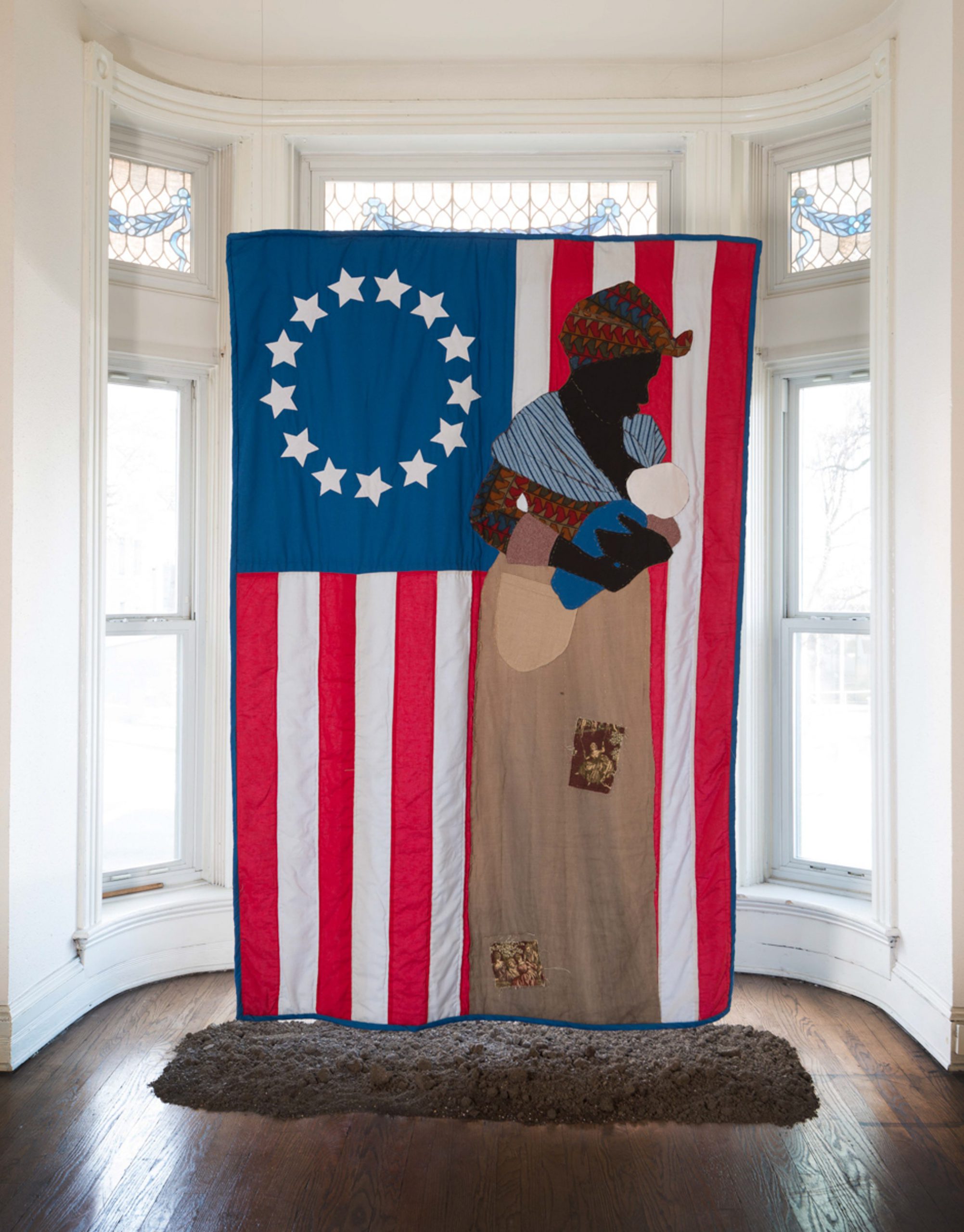 Stephen Towns, Birth of a Nation, 2014. Natural and synthetic fabric, polyester and cotton thread, metallic thread, coffee and tea stain, acrylic paint. 90 x 66 inches. Private collection.