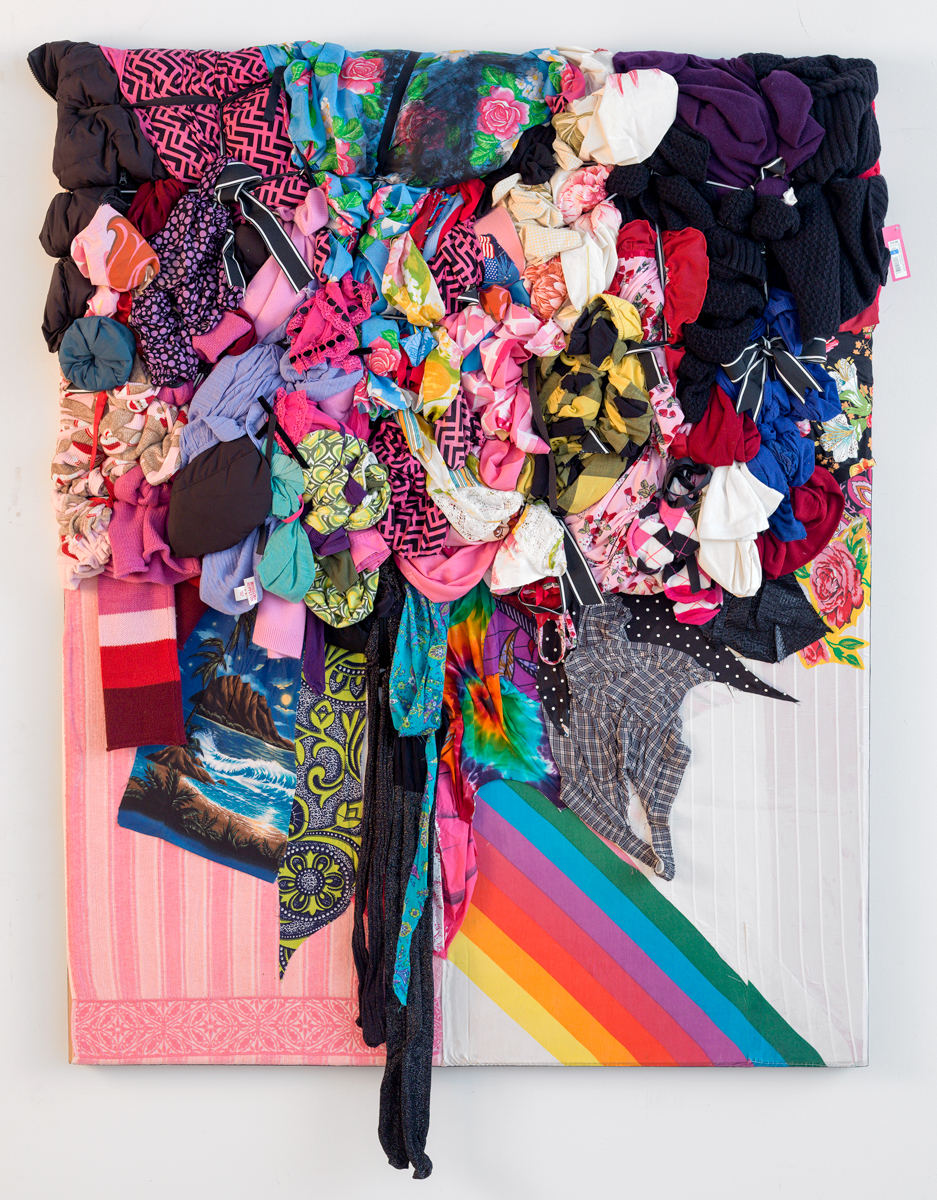 Shinique Smith, Bright Matter, 2013. Clothing and fabric culled from Los Angeles and ribbon on wood panel, 63 x 52 x 5 inches.